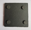 Slate coaster base showing four rubber non-slip feet