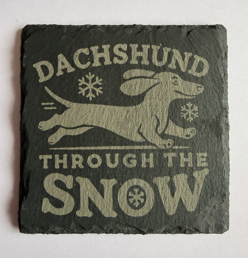 Dachshund Through the Snow laser engraved slate coaster with snowflakes