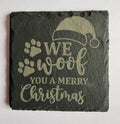 We Woof You a Merry Christmas laser engraved slate coaster with paw prints and Santa hat
