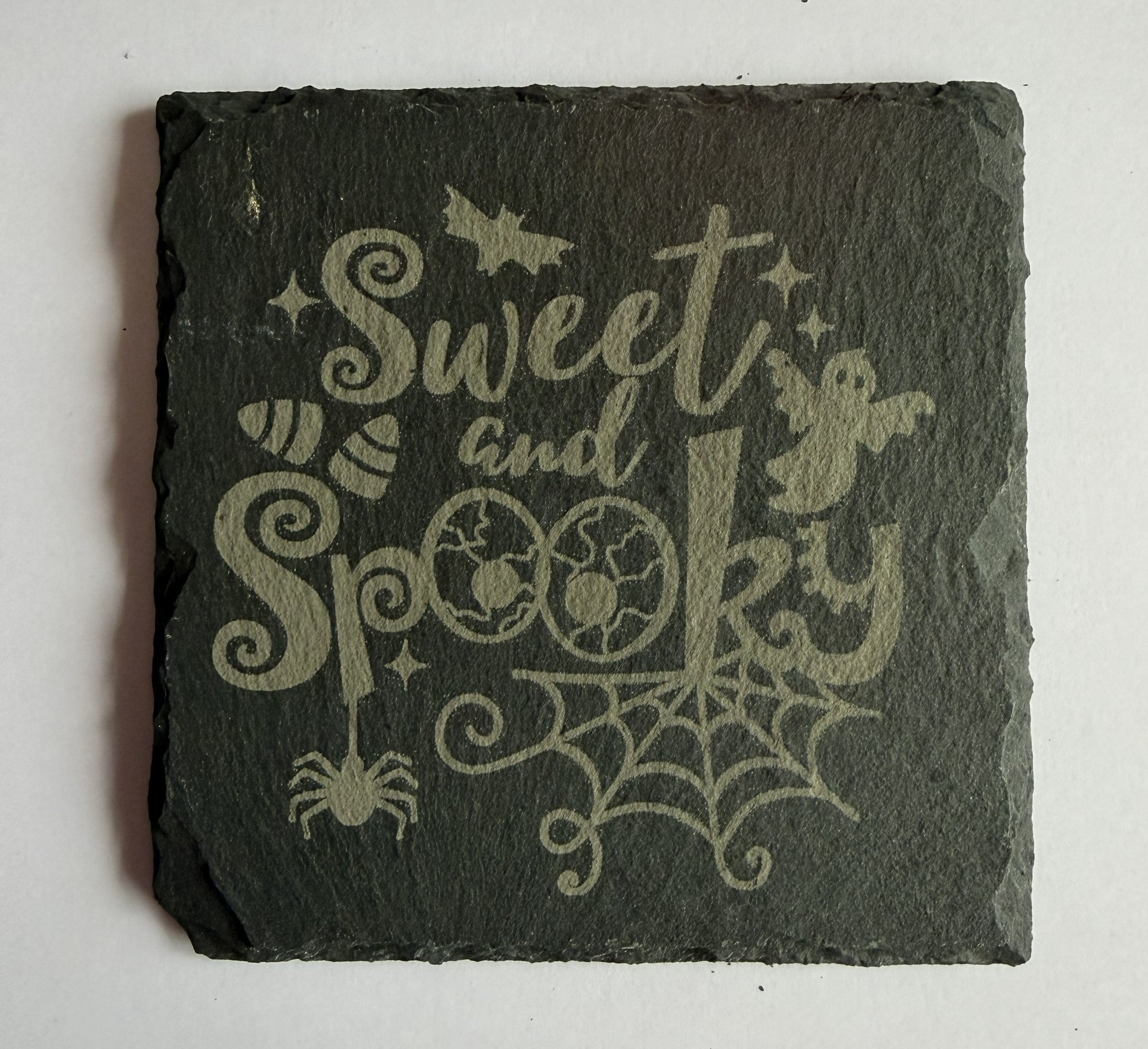 Sweet and Spooky laser engraved slate coaster with ghost, bat, spider and Halloween design