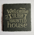 Welcome to Our Haunted House laser engraved slate coaster